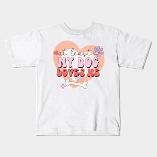 At least may dog loves me Kids T-Shirt